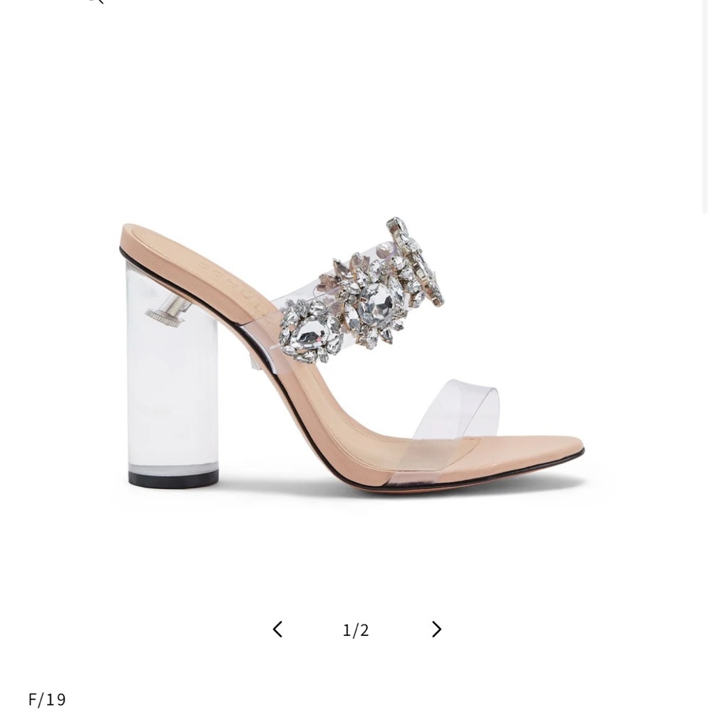 New (never worn) rhinestone heels. Purchased for wedding, not worn.